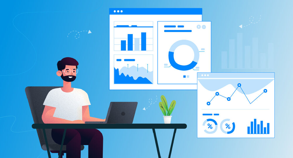 A man sitting behind a computer at a desk surrounded by charts and graphs to represent customer engagement metrics.